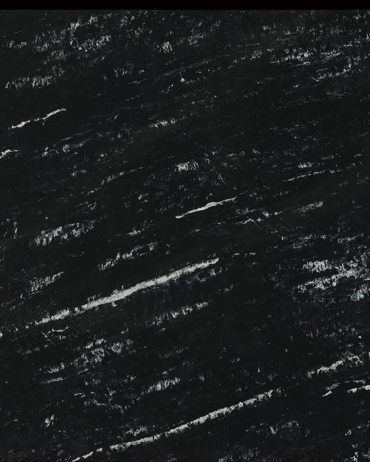 Dark engineered quartz